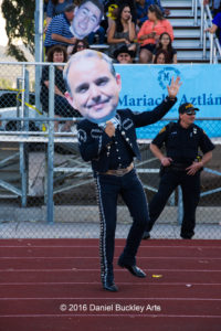 Director John Contreras dances at graduation