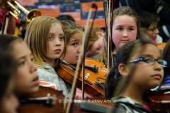 Members of Mariachi Las Aguilitas de Davis Bilingual Elementary School rehearse.