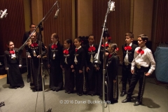 The Aguilitas singers assemble to record.