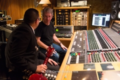 Engineer Jim Brady, (r), discusses the tracks with Jaime Valenzuela in the control room.